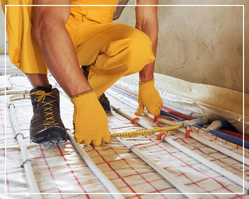 HVAC contractor at Woods Heating And Cooling performing Floor Heating Installation in custom home in Spearfish, SD.